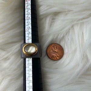 Gray resin ring with pale yellow stone -size 6